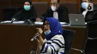 Mantan kuasa hukum Djoko S Tjandra, Anita Kolopaking saat menjadi saksi pada sidang lanjutan dugaan suap dan tindak pidana pencucian uang terkait kepengurusan fatwa MA dengan terdakwa Pinangki Sirna Malasari di Pengadilan Tipikor, Jakarta, Rabu (25/11/2020). (Liputan6.com/Helmi Fithriansyah)