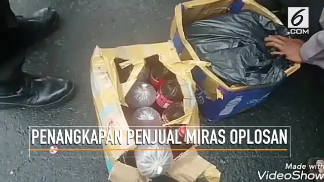Polres Metro Jakarta Timur menangkap tersangka penjual miras oplosan yang berkedok sebagai penjual keripik singkong di Cililitan.