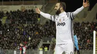 Gonzalo Higuain Merayakan Gol ke Gawang Cagliari (AP)