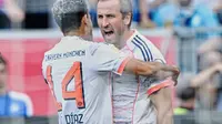 Selebrasi Harry Kane dalam laga Hoffenheim vs Bayern Munchen di Bundesliga 2025/2026, Sabtu (20/9/2025). (Uwe Anspach/dpa via AP)