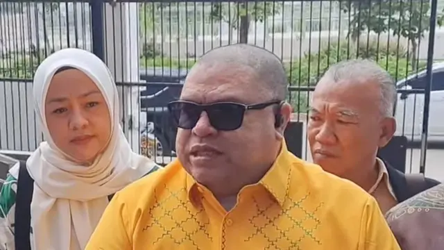 Razman Nasution.