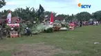 Dentuman meriam bersahutan, melengkapi kemeriahan suasana Desa Kaliwining, Kecamatan Rambipuji, Jember