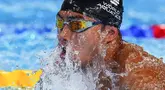 Perenang Indonesia Muhammad Dwiky Raharjo berlaga pada nomor 50 meter gaya dada putra pada Kejuaraan Akuatik Dunia di Doha, Qatar, 13 Februari 2024. (AP Photo/Hassan Ammar)