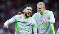 Pemain Manchester City, Rayan Cherki, bersama Erling Haaland merayakan gol ke gawang Nottingham Forest pada laga pekan ke-18 Premier League di Stadion The City Ground, Sabtu (27/12/2025). (Barrington Coombs/PA via AP)