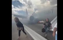 VIDEO: Detik-Detik Tegang 173 Penumpang Terjun dari Perosotan Darurat, Pesawat Terbakar di Bandara