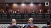 Mahkamah Konstitusi (MK) menggelar sidang uji materiil Undang-Undang nomor 28 tahun 2014 tentang Hak Cipta di Gedung Mahkamah Konstitusi, Jakarta, Kamis (10/7/2025). (Liputan6.com/Herman Zakharia)