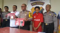 Arvian tak bisa berbuat banyak ketika polisi menangkapnya. Rambutnya yang gondrong tak bisa membantunya. (foto: Liputan6.com / edhie prayitno ige)