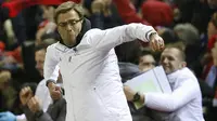 Ekspresi kegembiraan pelatih Liverpool, Jurgen Klopp, usai timnya menaklukan MU. Bekal dua gol tanpa kebobolan di kandang ini semakin mempermudah Liverpool untuk lolos ke babak perempat final. (Reuters/Carl Recine)