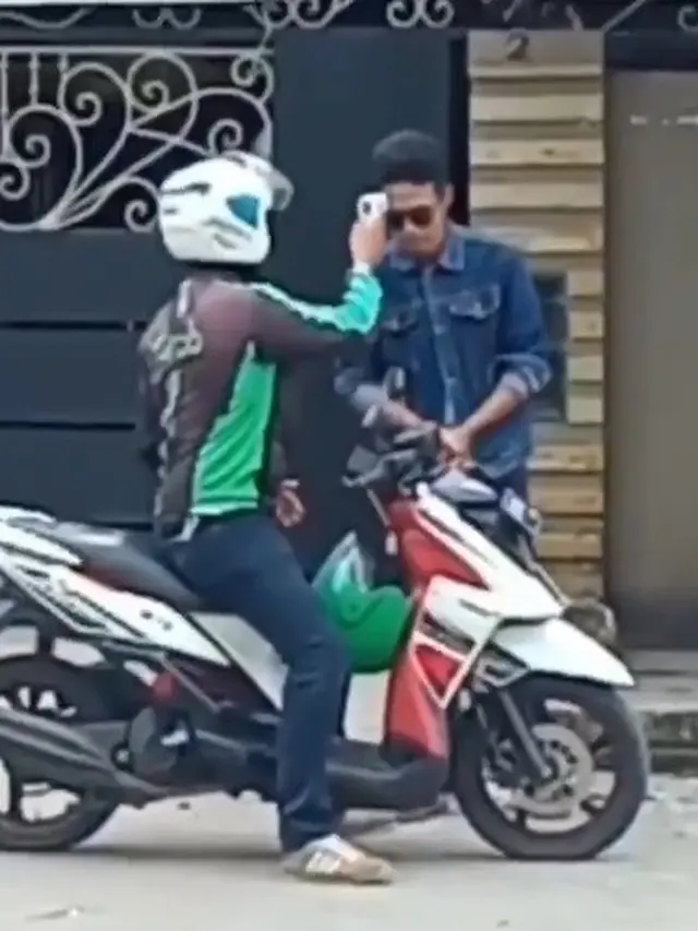 aksi ojol cek suhu tubuh penumpang viral