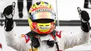 Ekspresi Rio Haryanto setelah meraih juara di Sprint Race GP2 Seri Inggris yang berlangsung di Sirkuit Silverstone, Inggris. Minggu (5/7/2015). (GP2 Media Service)