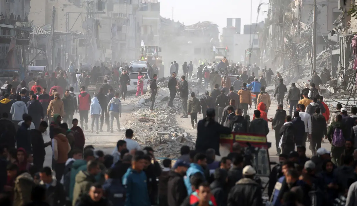 Sempat mengalami penundaan sekitar tiga jam, kesepakatan gencatan senjata antara Israel dan Hamas di Gaza dinyatakan mulai berlaku per Minggu 19 Januari 2025. (Eyad BABA/AFP)