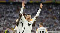 Jamal Musiala merupakan salah satu pemain muda di skuad Jerman. Meski baru berusia 21 tahun, Musiala telah rutin bermain untuk Die Mannschaft. Pemain Bayern Munchen ini memiliki harga pasar yang cukup tinggi yakni sebesar 120 juta euro. (AP Photo/Matthias Schrader)