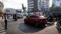 Kebijakan ganjil genap di Jakarta terus menjadi bagian penting dalam upaya mengatasi kemacetan. (Liputan6.com/Faizal Fanani)
