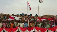 Satgas Garbha II FPU 9 Indonesia mengadakan lomba 17-an di kamp pengungsi Sudan dalam merayakan HUT RI ke-72. (aas/ninthmissioninDarfur)