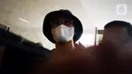 Indra Kesuma alias Indra Kenz tiba di Gedung Bareskrim, Jakarta, Kamis (24/2/2022). Indra Kenz menjalani pemeriksaan terkait kasus dugaan penipuan investasi bodong aplikasi trading binary option Binomo. (merdeka.com/Imam Buhori)