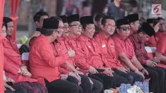 Basuki Tjahaja Purnama  dan Djarot Saiful Hidayat saat menghadiri upacara HUT ke-74 RI di Jakarta, Sabtu (17/8/2019). Upacara HUT ke-74 Kemerdekaan RI tersebut diikuti ratusan kader dan simpatisan partai PDIP. (Liputan6.com/Faizal Fanani)