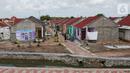 Pemukiman warga pesisir yang telah direnovasi di Desa Ketapang, Mauk, Kabupaten Tangerang (21/01/2022). Sejak tahun 2019 telah dilaksanakan pemberdayaan masyarakat, pemukiman layak huni, konservasi hutan mangrove, hingga pengembangan dan pelatihan ekonomi kreatif. (Liputan6.com/Fery Pradolo)