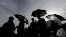Aksi Diam Kamisan ke-380 itu merupakan aksi pertama para keluarga korban   pelanggaran HAM di tahun 2015, Istana Merdeka, Jakarta, Kamis (8/1/2015). (Liputan6.com/Faizal Fanani) 