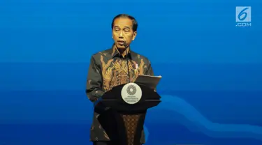 Presiden Joko Widodo saat berpidato dalam Bali Fintech Agenda IMF-WB 2018 di Nusa Dua, Bali, Kamis (11/10). Acara ini membahas berbagai peluang dan tantangan yang bisa diperoleh dari teknologi. (Liputan6.com/Angga Yuniar)