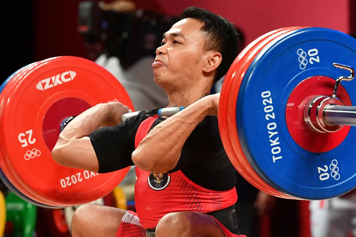 Foto: Eko Yuli Irawan Persembahkan Medali Kedua bagi Indonesia Setelah Sabet Perak di Cabang Olahraga Angkat Besi Olimpiade Tokyo 2020