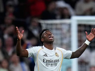 Vinicius Jr menjadi pahlawan kemenangan Real Madrid atas Benfica dalam laga leg 2 play off Liga Champions 2025/2026 di Santiago Bernabeu, Madrid, Spanyol, Rabu (25/02/2026) waktu setempat. (AP Photo/Manu Fernandez)