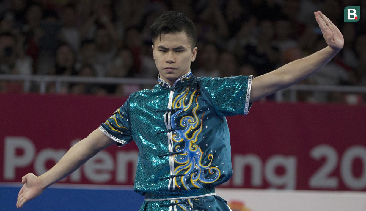 Atlet Wushu, Edgar Xavier, saat beraksi pada nomor Cangquan putra Asian Games di JIExpo, Jakarta, Minggu, (19/8/2018). Edgar Xavier berhasil meraih perak dengan angka 9.72. (Bola.com/Vitalis Yogi Trisna)