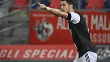 Bintang Juventus Cristiano Ronaldo merayakan golnya ke gawang Bologna pada pekan ke-27 Liga Italia di Stadion Renato Dall'Ara, Selasa (23/6/2020) dini hari WIB.(Massimo Paolone / LaPresse via AP)