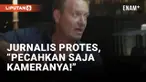 Kegiatan siaran langsung televisi Denmark di Doha Qatar tiba-tiba terhenti insiden pelarangan dari petugas keamanan. Sontak, jurnalis yang sedang bertugas meliput Piala Dunia 2022 menyampaikan protes keras.