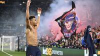 Pemain muda PSG, Desire Doue, melakukan selebrasi setelah mencetak gol ke gawang Inter Milan pada final Liga Champions 2024/2025 di Stadion Allianz Arena, Munich, Minggu (1/6/2025) dini hari WIB. (Sven Hoppe/dpa via AP)