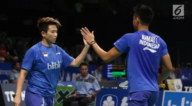 Ganda Campuran Indonesia, Tontowi Ahmad/Liliyana Natsir saat laga melawan Hafiz Faizal/Shela Devi Aulia di Babak Kedua Indonesia Open 2017 di Jakarta, Jumat (16/6). Tontowi Ahmad/Liliyana Natsir menang 21-17, 22-20. (Liputan6.com/Helmi Fithriansyah)