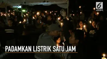 Mengurangi dampak perilaku manusia terhadap kerusakan bumi, warga Palangkaraya, memadamkan listrik dan menyalakan lilin selama 1 jam.