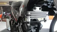 Mengapa Suzuki Satria F150 cepat panas jika dikendarai dengan kecepatan rendah? 