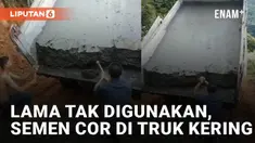 Sebuah truk bawa semen cor namun kering karena lama tak digunakan mengundang perhatian