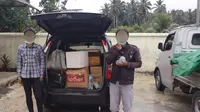 Pelaku dan barang bukti berupa ratusan liter miras jenis Cap Tikus diamankan Polres Bolmong.