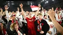 Suka cita menyelimuti para pemain dan pendukung SC Frieburg setelah berhasil lolos ke babak final Liga Europa 2025/2026, Kamis (07/05/2026). (AP Photo/DPA/Philipp von Ditfurth)