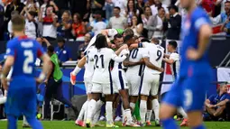 The Three Lions berhasil memetik kemenangan dramatis di babak 16 besar Euro 2024. (INA FASSBENDER/AFP)