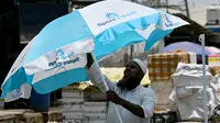 Gelombang panas semakin parah pasca ibukota Delhi mencatat suhu tertinggi mereka di nyaris 50 derajat Celcius. (Arun SANKAR/AFP)