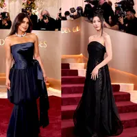 Salah satu yang paling menyita sorotan adalah Priyanka Chopra-Jonas. Ia tampil anggun dalam bustier satin navy berpotongan drapery yang dipadukan dengan rok sutra navy mengalir. Look ini menonjolkan kekuatan struktur khas couture Dior dengan sentuhan sensual yang refined. [Dok/DIOR].