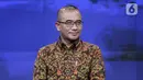 Ketua Komisi Pemilihan Umum (KPU) Hasyim Asy'ari saat acara penandatanganan MoU antara Emtek dengan KPU di SCTV Tower, Jakarta, Selasa (30/8/2022). Kerja sama KPU dengan Emtek ini terkait sosialisasi Pemilihan Umum yang akan diselenggarakan 2024 mendatang. (Liputan6.com/Johan Tallo)