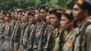 Anggota Banser NU berbaris saat mengikuti Apel Kebangsaan di Perkemahan Ragunan, Jakarta, Selasa (18/4). Apel Kebangsaan dan Kemah Kemanusiaan ini diikuti ribuan anggota Banser NU dari berbagai daerah. (Liputan6.com/Helmi Fithriansyah)