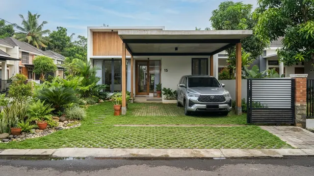 Inspirasi Carport Berlantai Grass Block yang Cocok untuk Rumah Modern Minimalis Model Menyatu dengan Taman Depan