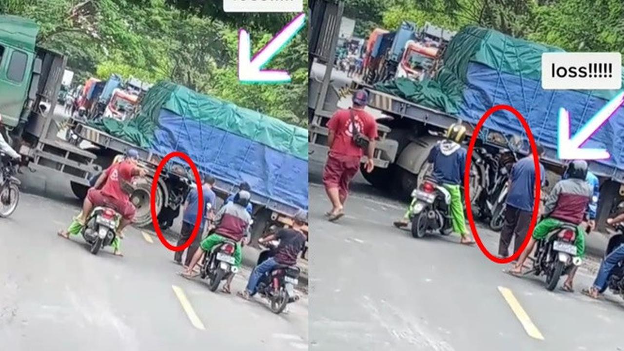 Viral, Video Aksi Nekat Orang Lewat Kolong Truk Trailer Ini Bikin Geregetan