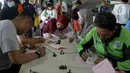 Palang Merah Indonesia (PMI) Jakarta Utara mengadakan kegiatan Donor Darah pada bulan Ramadan 1445 Hijriah. (Liputan6.com/Herman Zakharia)
