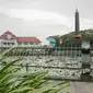 Tugu Malang menjadi maskot masyarakat Malang dan banyak warga datang untuk bersantai, Rabu (21/1/2015). (Liputan6.com/Faizal Fanani)