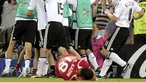 German teammates celebrate as Turkish midfielder Kazim Kazim lies on the ground after the Euro 2008 championships semi-final football match Germany vs. Turkey on June 25, 2008 at St. Jakob-Park stadium in Basel, Switzerland. AFP PHOTO DDP / THOMAS LOHNES