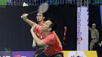 Mohammad Ahsan/Hendra Setiawan merengkuh gelar juara setelah di final mengalahkan Frengky Wijaya Putra/Sabar Karyaman Gutama 21-13, 21-17 di GOR Sahabudin, Pangkalpinang, Sabtu (2/12/2017). (PBSI)