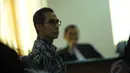 Dalam pembelaannya Wawan membantah melakukan suap terkait pengurusan Pilkada Lebak Banten di Mahkamah Konstitusi di Pengadilan Tipikor Jakarta, Senin (9/6/2014) (Liputan6.com/Miftahul Hayat)