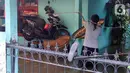 BPBD Jakarta mengingatkan warga akan adanya potensi hujan dengan intensitas tinggi yang bisa memicu peningkatan status kewaspadaan. (Liputan6.com/Herman Zakharia)