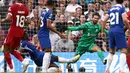 Satu gol Chelsea dicetak oleh bek baru mereka asal Prancis, Axel Disasi. (Photo by HENRY NICHOLLS / AFP)