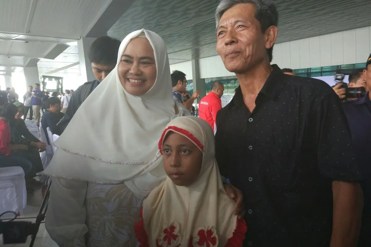 Orangtua Tontowi Ahmad ikut menjemput putranya di Bandara Soekarno Hatta 